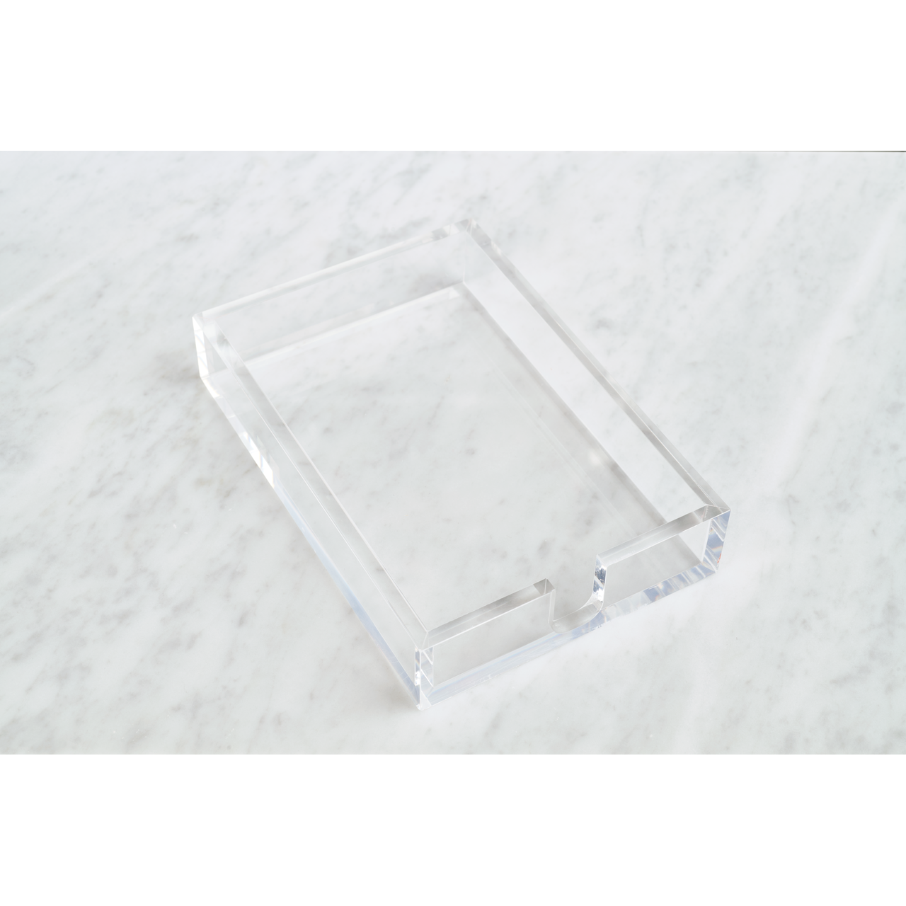 Clear acrylic 4x6 notepad holder on a white marble surface - Desk organization by Taylor Paladino