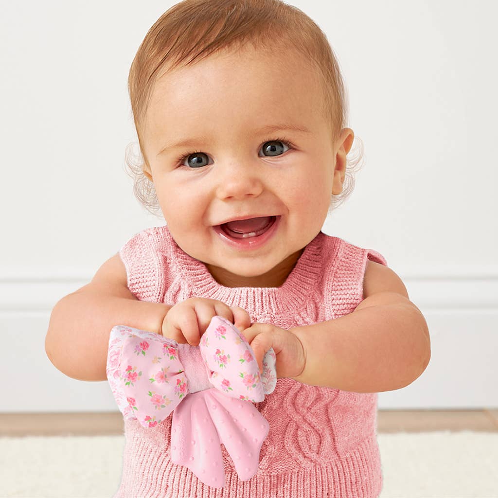 Itzy Ritzy Bow Sweetie Crinkle™ - 2-in-1 Silicone Teether & Plush Activity Toy