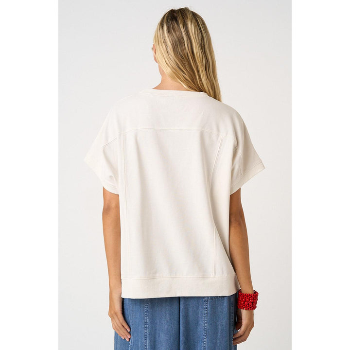 Mittoshop White Knit top featuring "Jesus Loves You" lettering patchwork, short sleeves, and a relaxed fit.