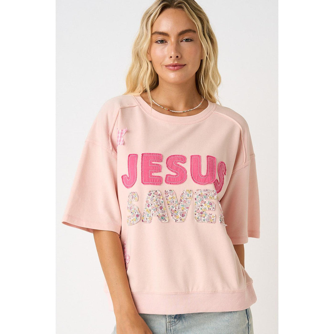 Mittoshop Icy Pink Knit Top featuring "Jesus Saves" lettering, star patches, and floral patchwork details.