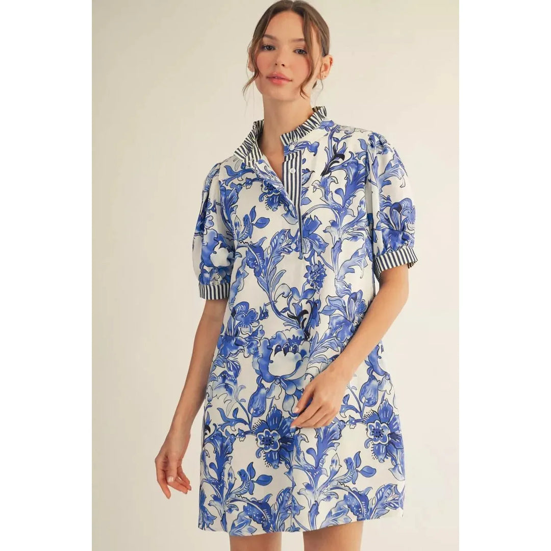 Marisol tropical dress in Royal Blue floral print with striped trim and button-down front.