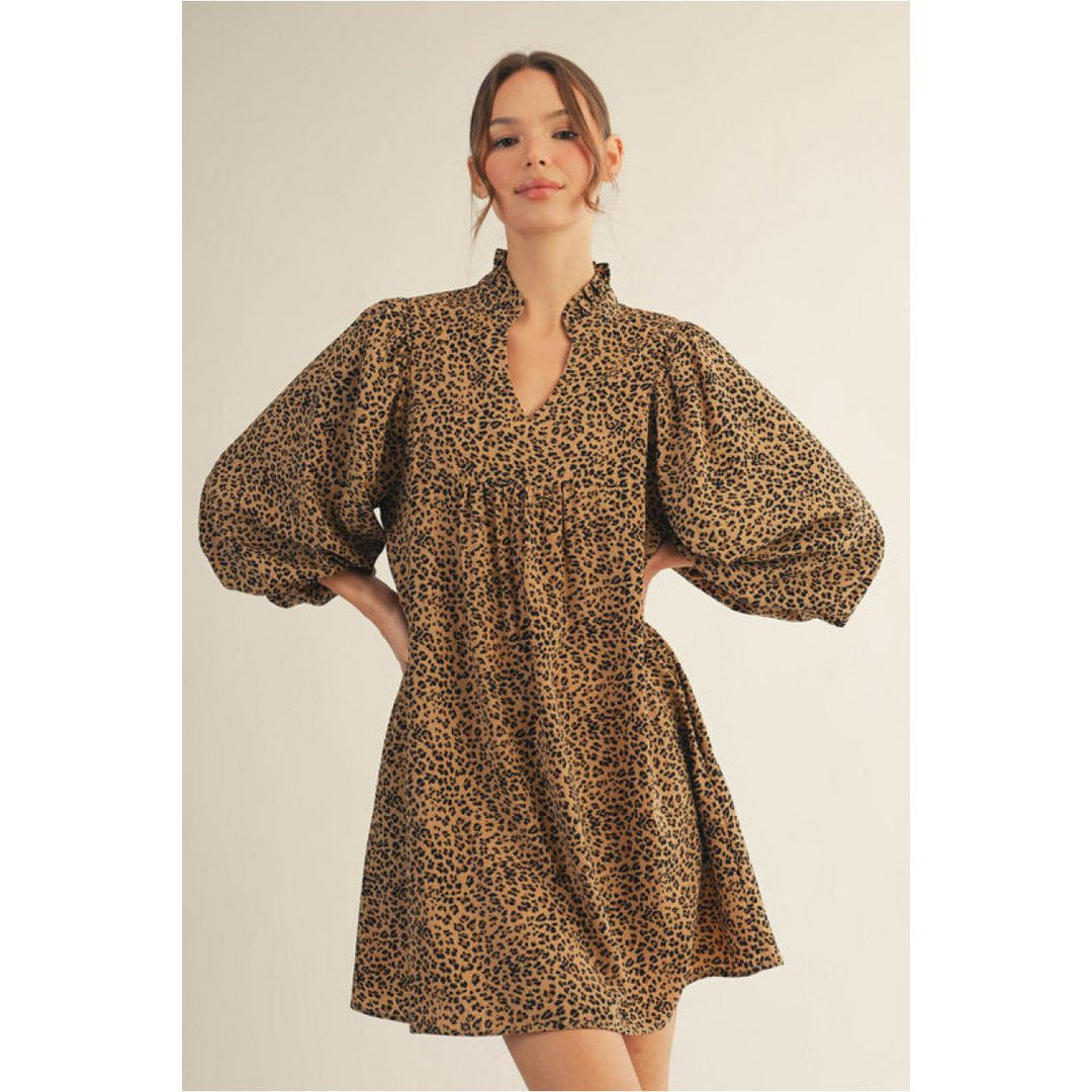 Woman wearing a leopard print dress. Jodifl. G14867-2