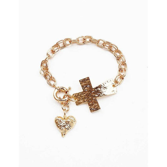 Gold chain bracelet with cross and heart charms on a white background