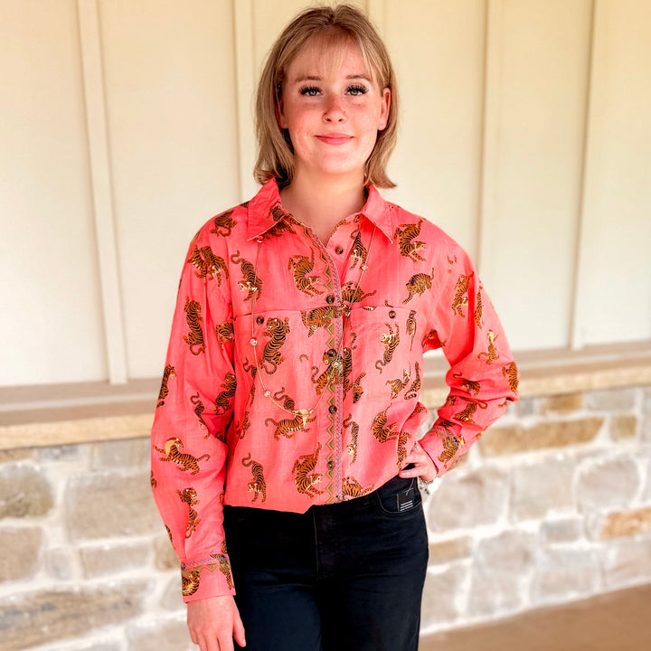 Model wearing the Ivy Jane warm coral tiger print camp collar button-down shirt.