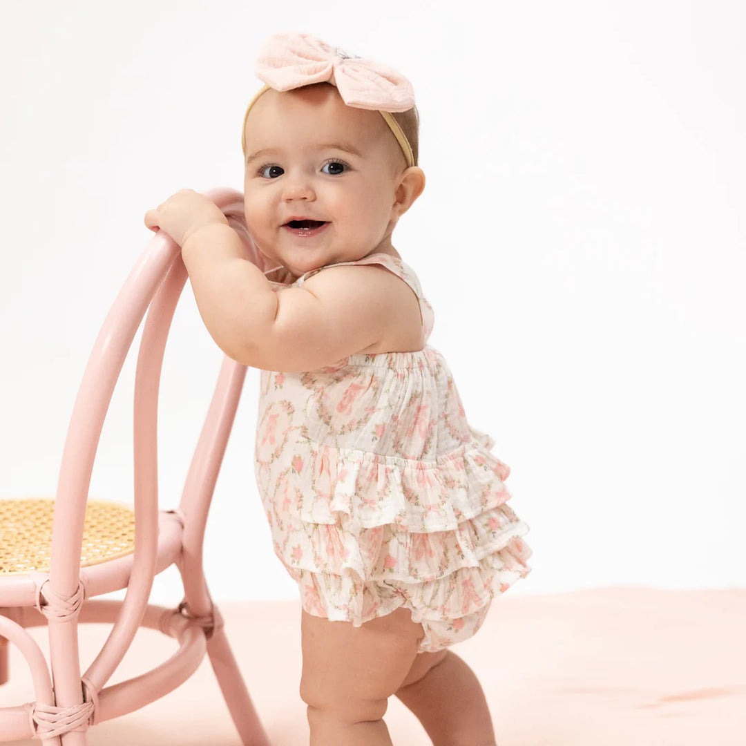 Baby girl pink organic muslin sunsuit with ruffles and ballet shoe print