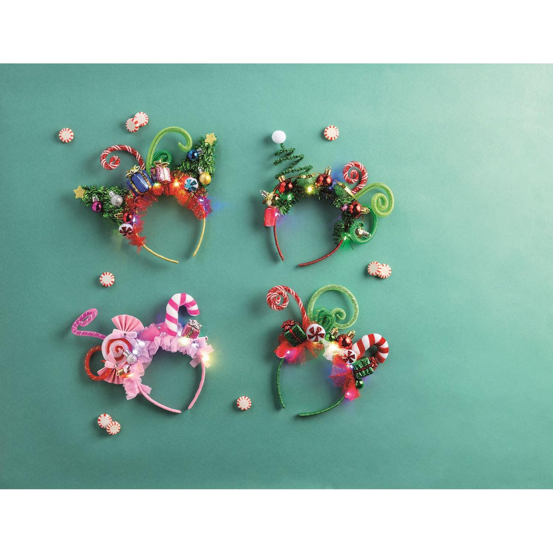 Mud Pie light-up festive Christmas headbands featuring LED lights, available in multiple colors.
