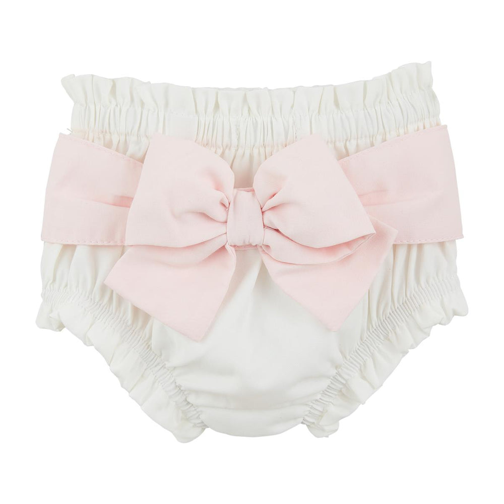 Close-up of the crisp white cotton poplin diaper cover with a soft pink contrast bow.