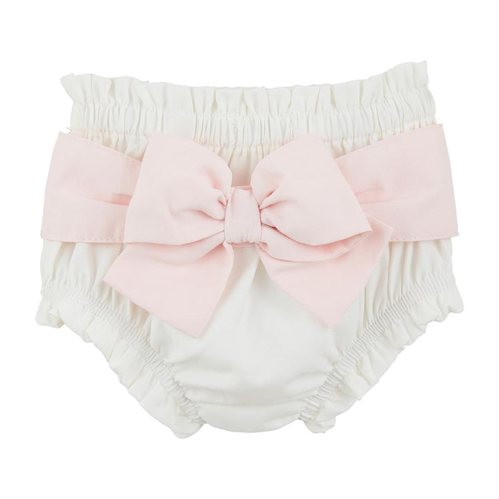 Close-up of the crisp white cotton poplin diaper cover with a soft pink contrast bow.