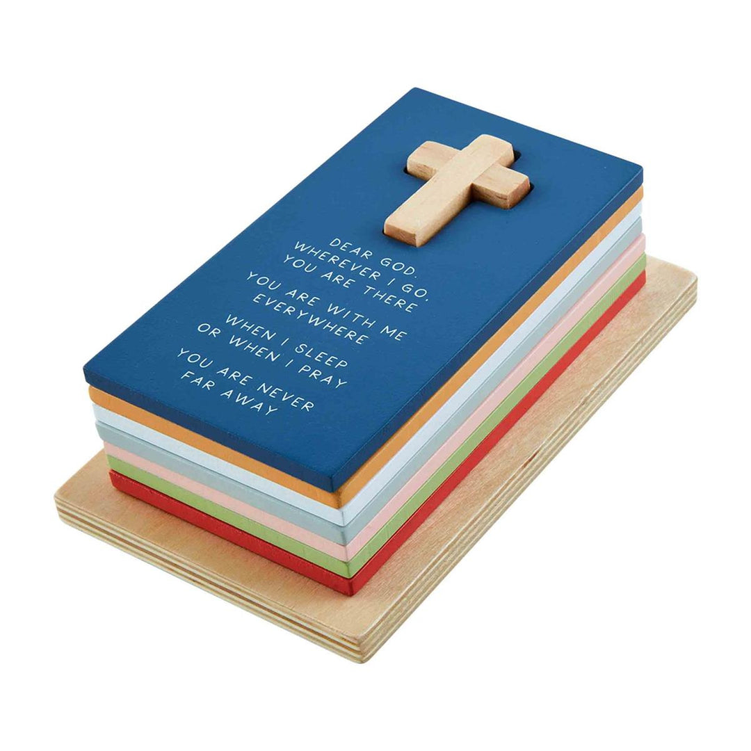 8-piece Mud Pie wooden prayer puzzle stacker featuring colorful prayer boards stacked on a cross post.