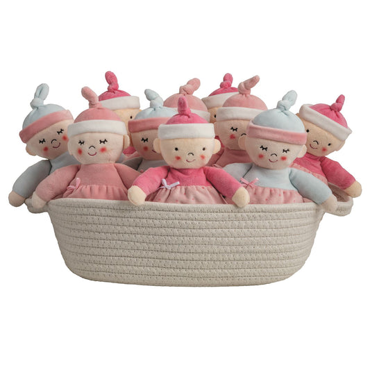 Set of Baby's First Baby Dolls in pink and light blue minky fabric, displayed in a white cotton rope basket.