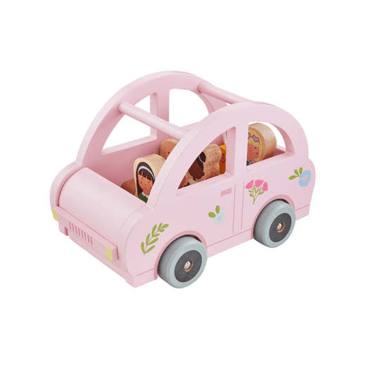 Pink wooden car toy with four wooden passenger figures and a tiny suitcase, featuring a magnetic design.