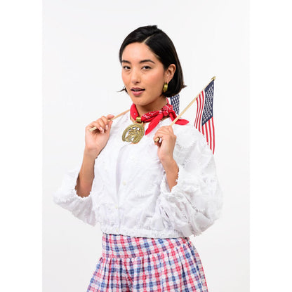 Close-up of the pleated detailing and pointed collar on the white Ivy Jane Sundance Jacket.