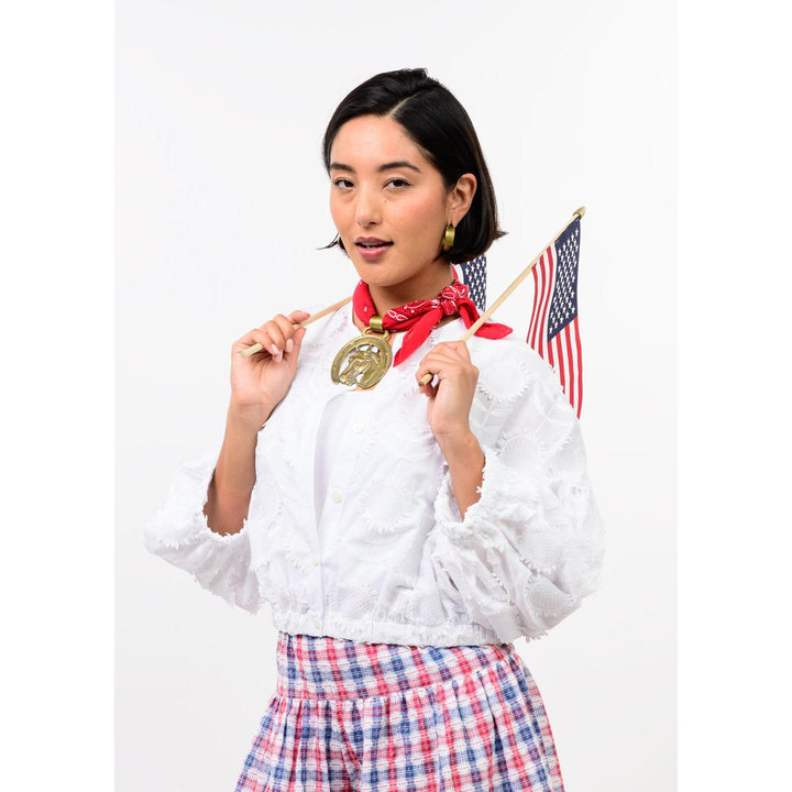 Close-up of the pleated detailing and pointed collar on the white Ivy Jane Sundance Jacket.