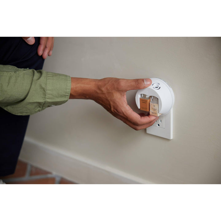 Swapping a fragrance vial in the Pura Home V5 smart diffuser
