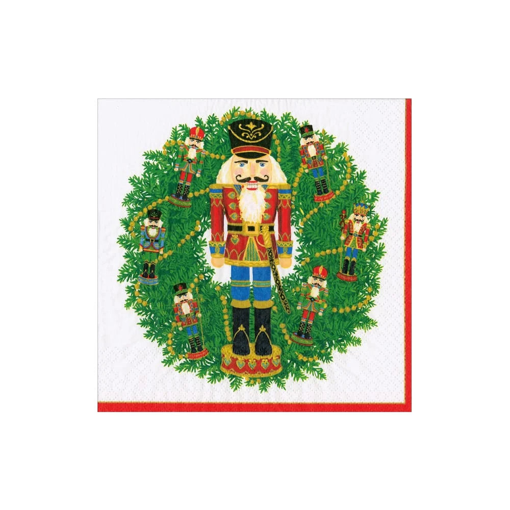 Caspari Nutcracker Wreath Cocktail Napkins featuring a festive nutcracker and lush evergreen wreath.