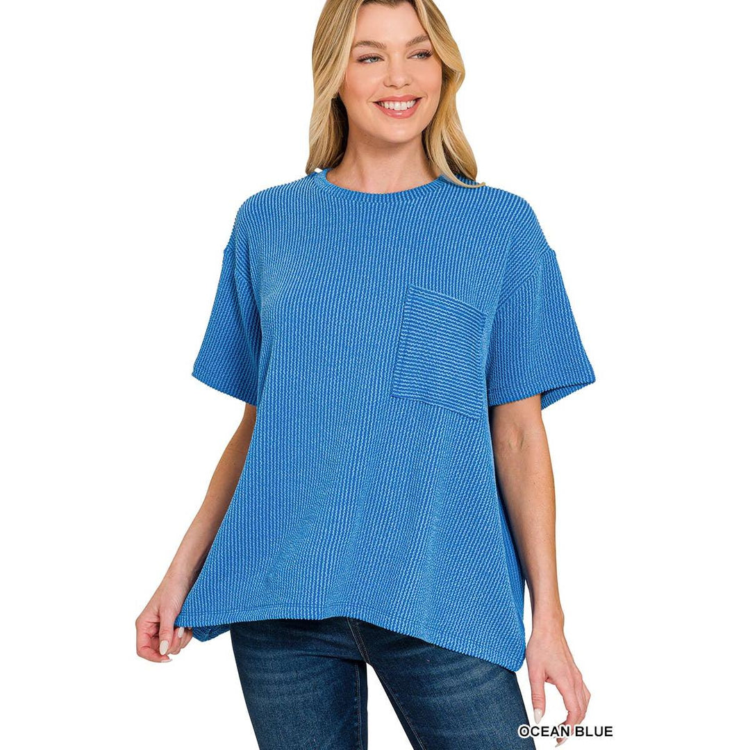 Model wearing the 42POPS Ocean Blue corded rib short sleeve top with a functional front chest pocket and a relaxed fit.
