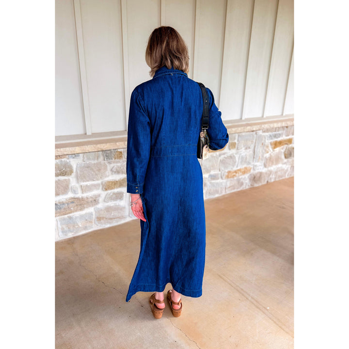 Back view of the Uncle Frank indigo Tencel denim shirtwaist dress showing its fluid, flattering drape.
