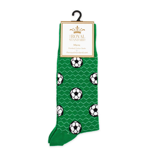 Close-up of Men's green crew socks with white and black soccer ball pattern by The Royal Standard.