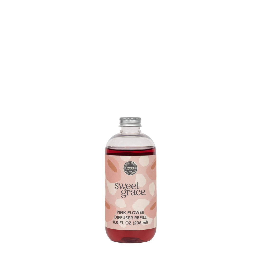 Bottle of Bridgewater Candle Company Sweet Grace Pink Dye Fragrance Refill Oil for flower diffusers.