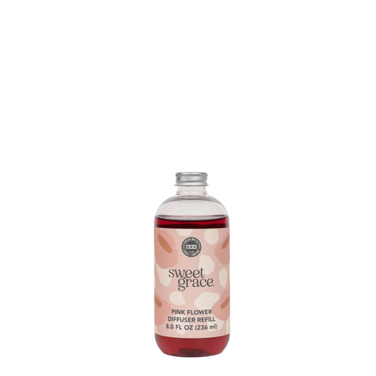 Bottle of Bridgewater Candle Company Sweet Grace Pink Dye Fragrance Refill Oil for flower diffusers.