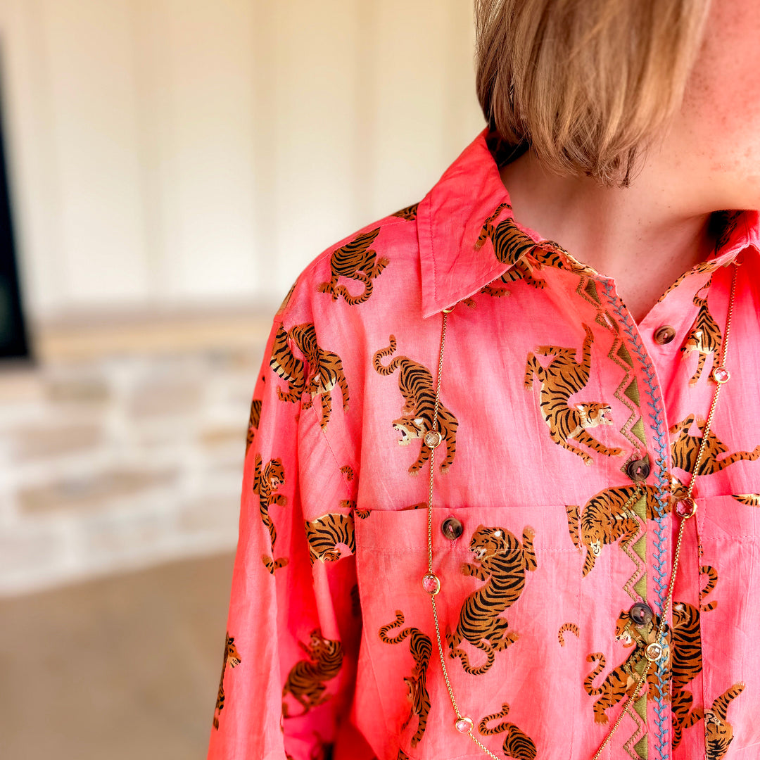 Close-up of the fierce tiger print and camp collar detail on the Ivy Jane coral shirt.
