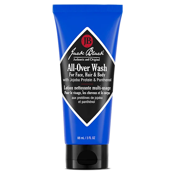 Jack Black All-Over Wash for Face, Hair, and Body in its signature deep blue squeeze tube packaging with a black flip cap lid.