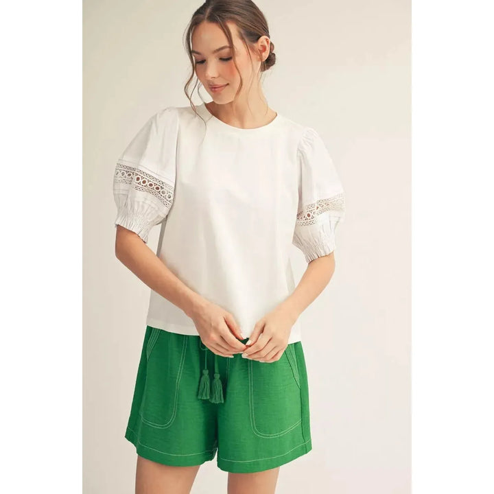 Jodifl Hazel short sleeve top in white featuring romantic puff sleeves with sheer lace panels.