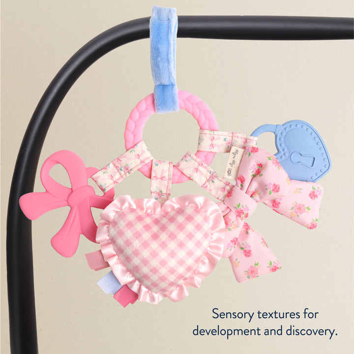 Itzy Ritzy Bow Bitzy Busy Ring -Stroller &amp; Car Seat Sensory Travel Toy