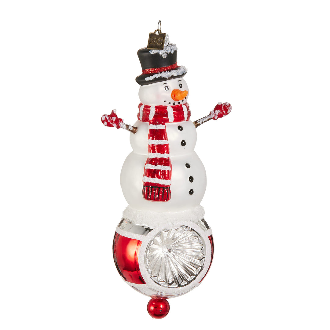 RAZ EC 7.5" Snowman Reflector Ornament featuring a vintage-style glass snowman design by Eric Cortina.