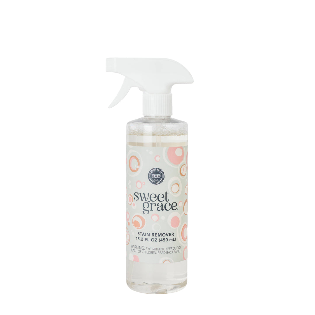 Full-size bottle of Sweet Grace Laundry and Fabric Stain Remover Spray by Bridgewater Candle Company.