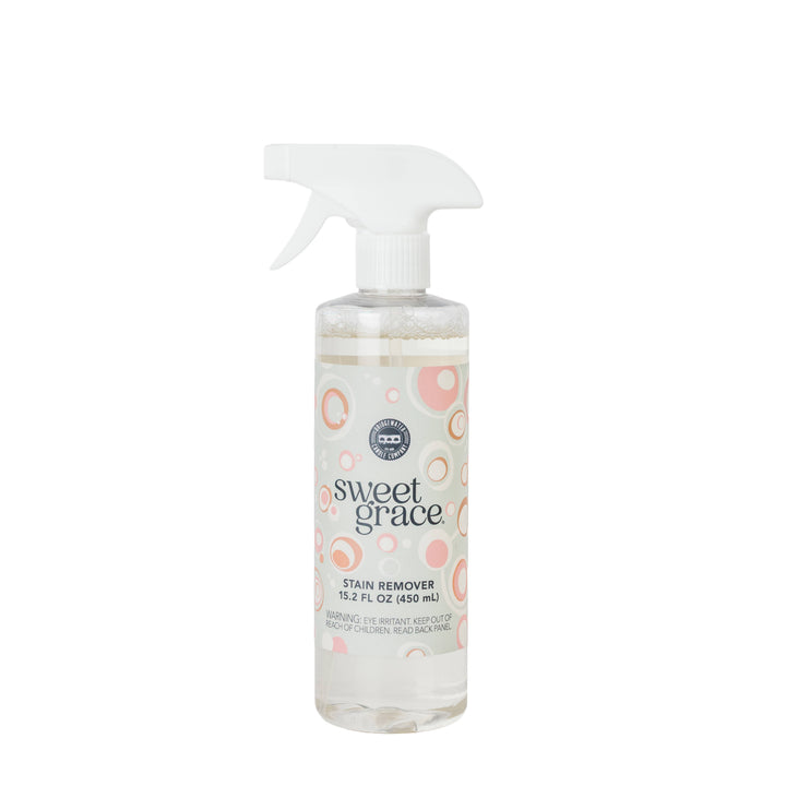 Full-size bottle of Sweet Grace Laundry and Fabric Stain Remover Spray by Bridgewater Candle Company.