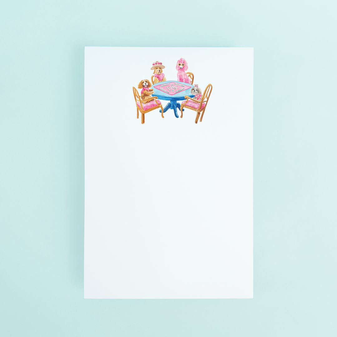 Taylor Paladino 4x6 notepad featuring watercolor illustrations of various dog breeds sitting around a table playing Mahjong.