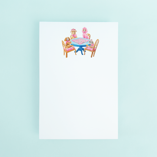 Taylor Paladino 4x6 notepad featuring watercolor illustrations of various dog breeds sitting around a table playing Mahjong.