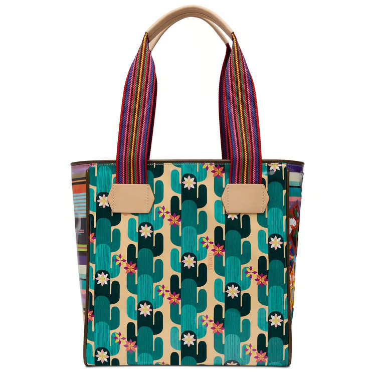 	Back view of the Consuela Dezi Classic Tote showing Spike print and woven leather handles