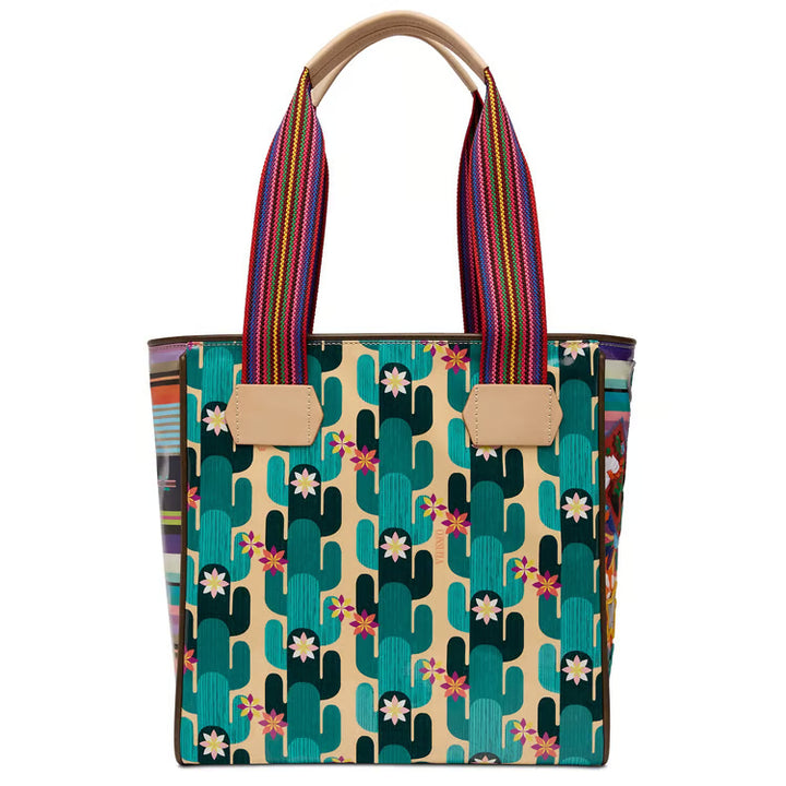 	Back view of the Consuela Dezi Classic Tote showing Spike print and woven leather handles