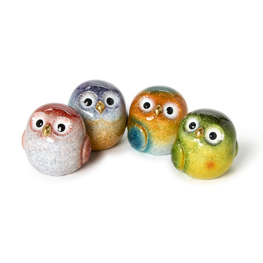 Four assorted hand-painted resin owls in red, blue, green, and orange; whimsical woodland home decor accents.