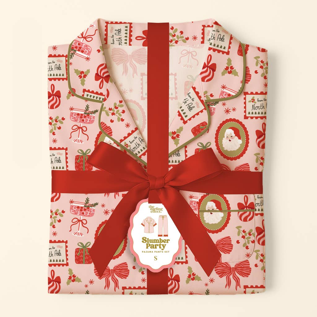 Buttery-soft stretch holiday pajamas by The Darling Effect in the Mistletoe Magic print.