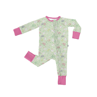 Children's onesie with floral pattern and pink cuffs on a white background