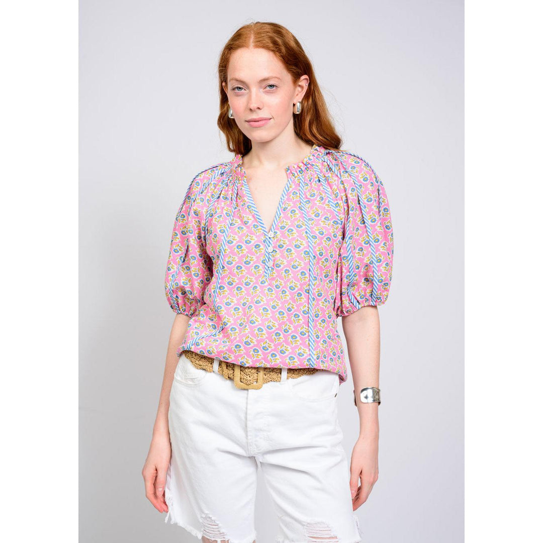 Ivy Jane floral print top with blue and white striped knit trim on the neck and sleeves.