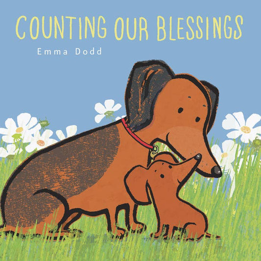 Front cover of the Counting Our Blessings board book featuring a sweet illustration of a dog and puppy with foil accents.
