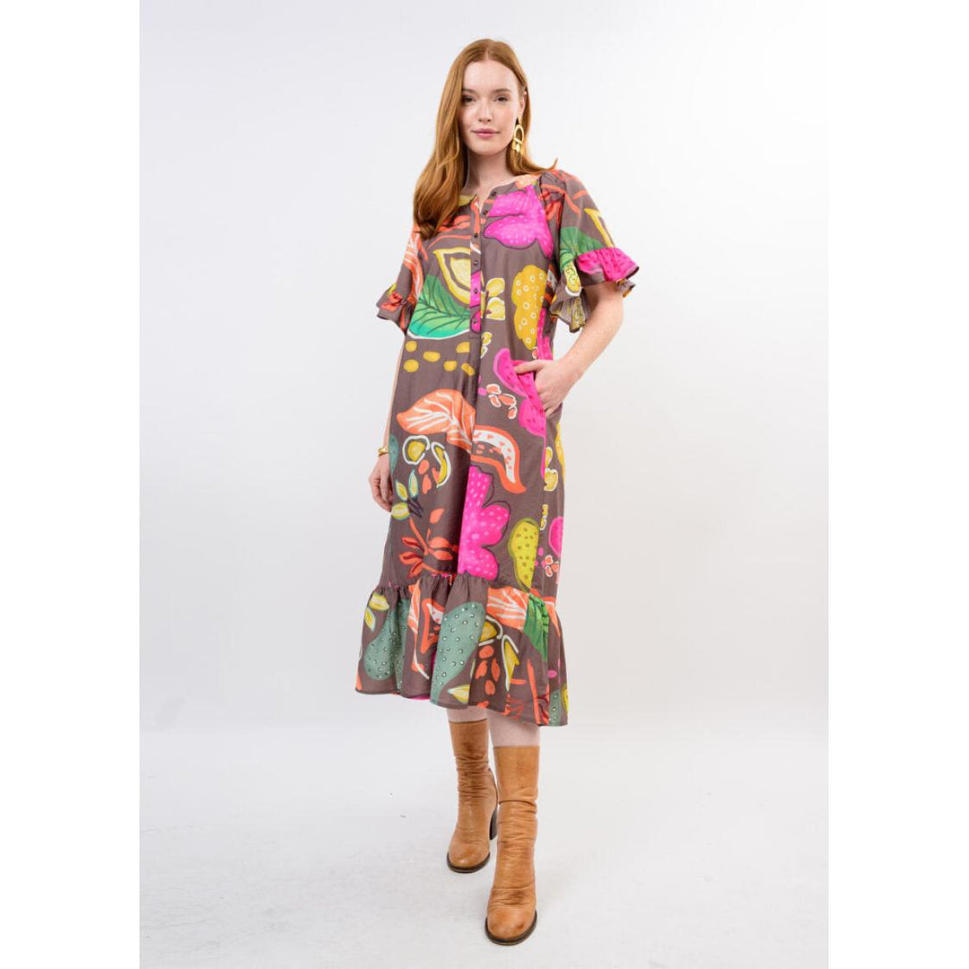 Model wearing the relaxed-fit Uncle Frank Patio Dress in Brown.