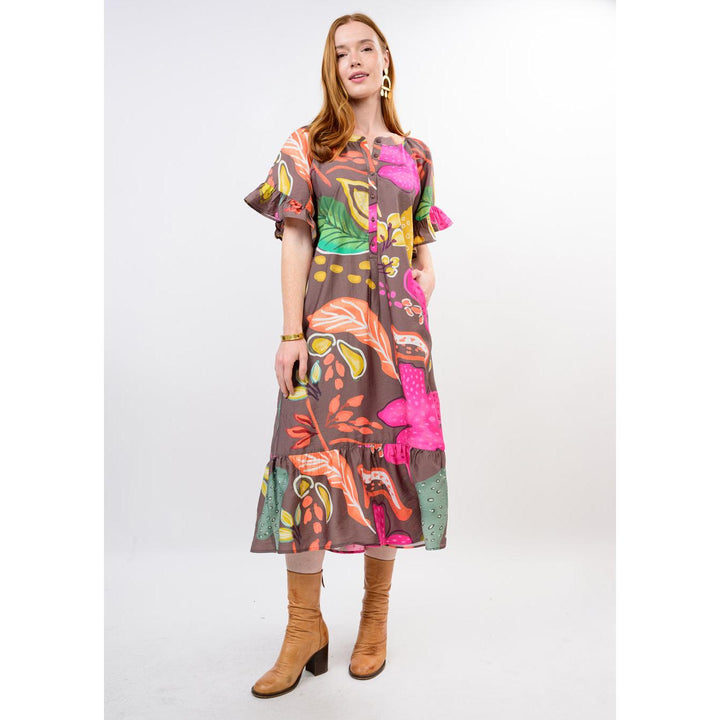 Model wearing the relaxed-fit Uncle Frank Patio Dress in Brown.