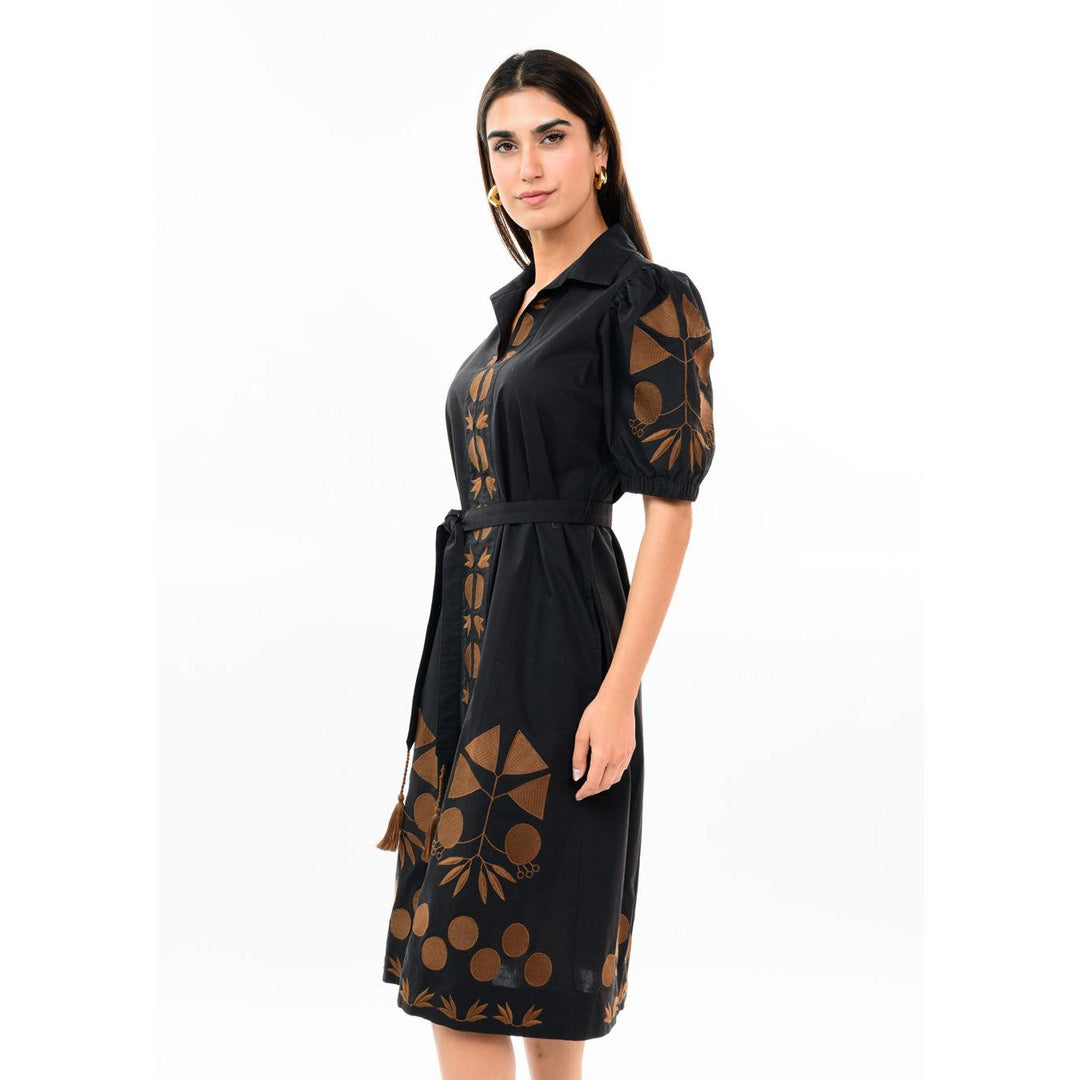 Close-up detail of the beautiful embroidery on the front placket of the black Uncle Frank dress.