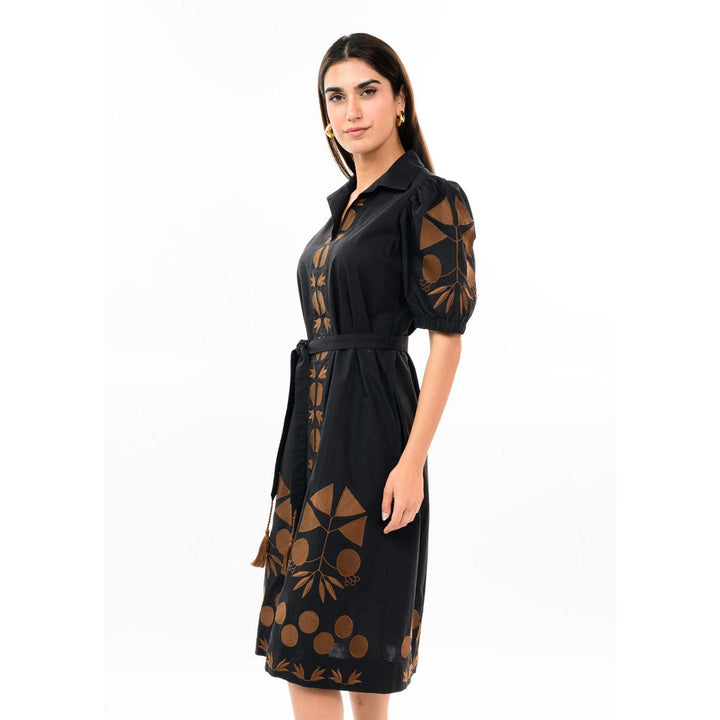 Close-up detail of the beautiful embroidery on the front placket of the black Uncle Frank dress.