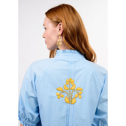 Close-up of the intricate embroidery and artisanal stitching details on the Blocked Embroidery Dress.