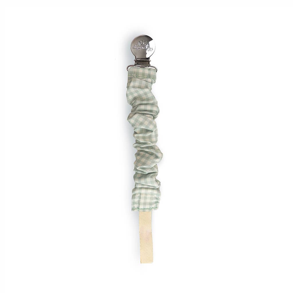 Itzy Ritzy Cinch Pacifier Strap featuring a classic Green Gingham print and secure clasp.