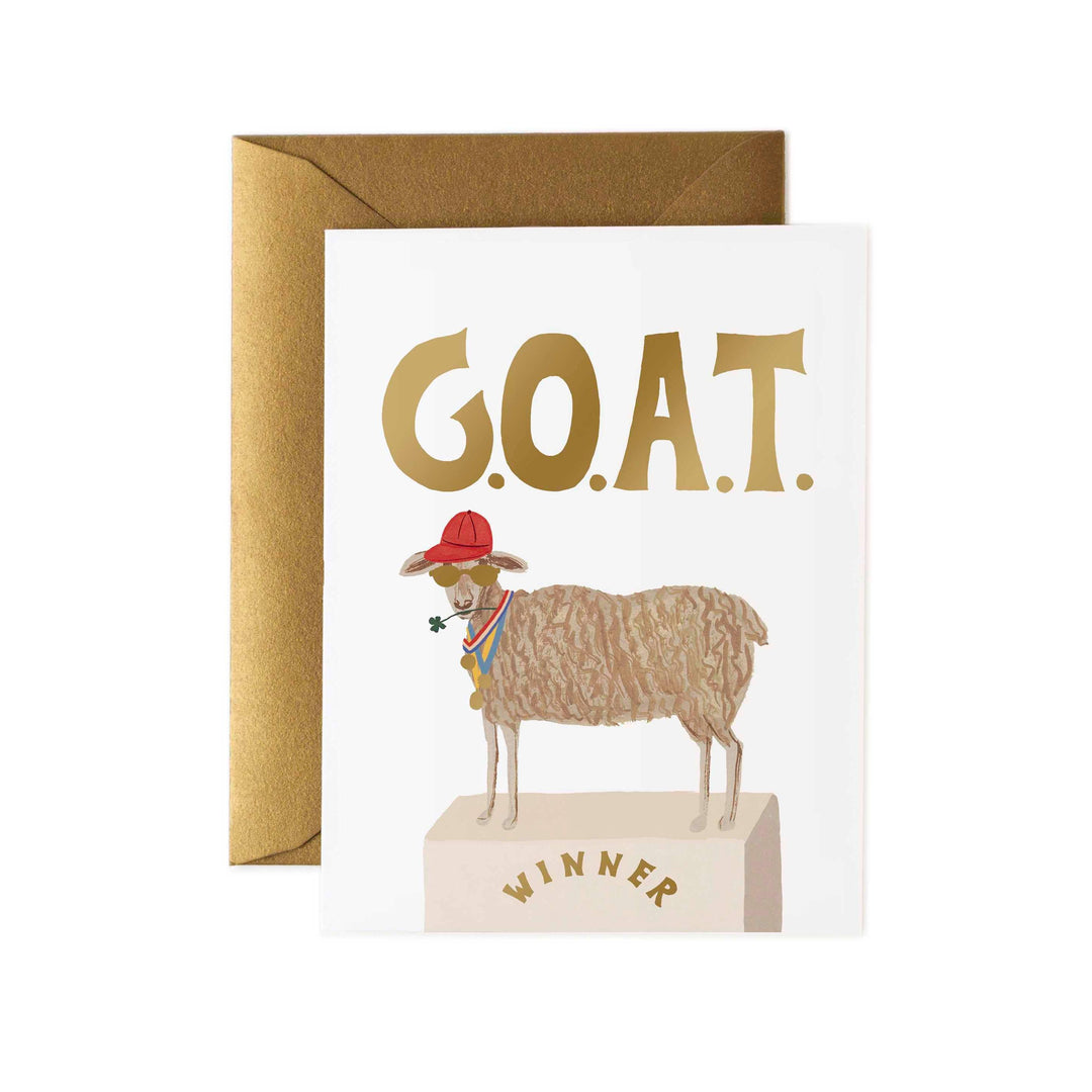 Rifle Paper Co. G.O.A.T. Card featuring metallic gold foil text and a matching gold envelope.