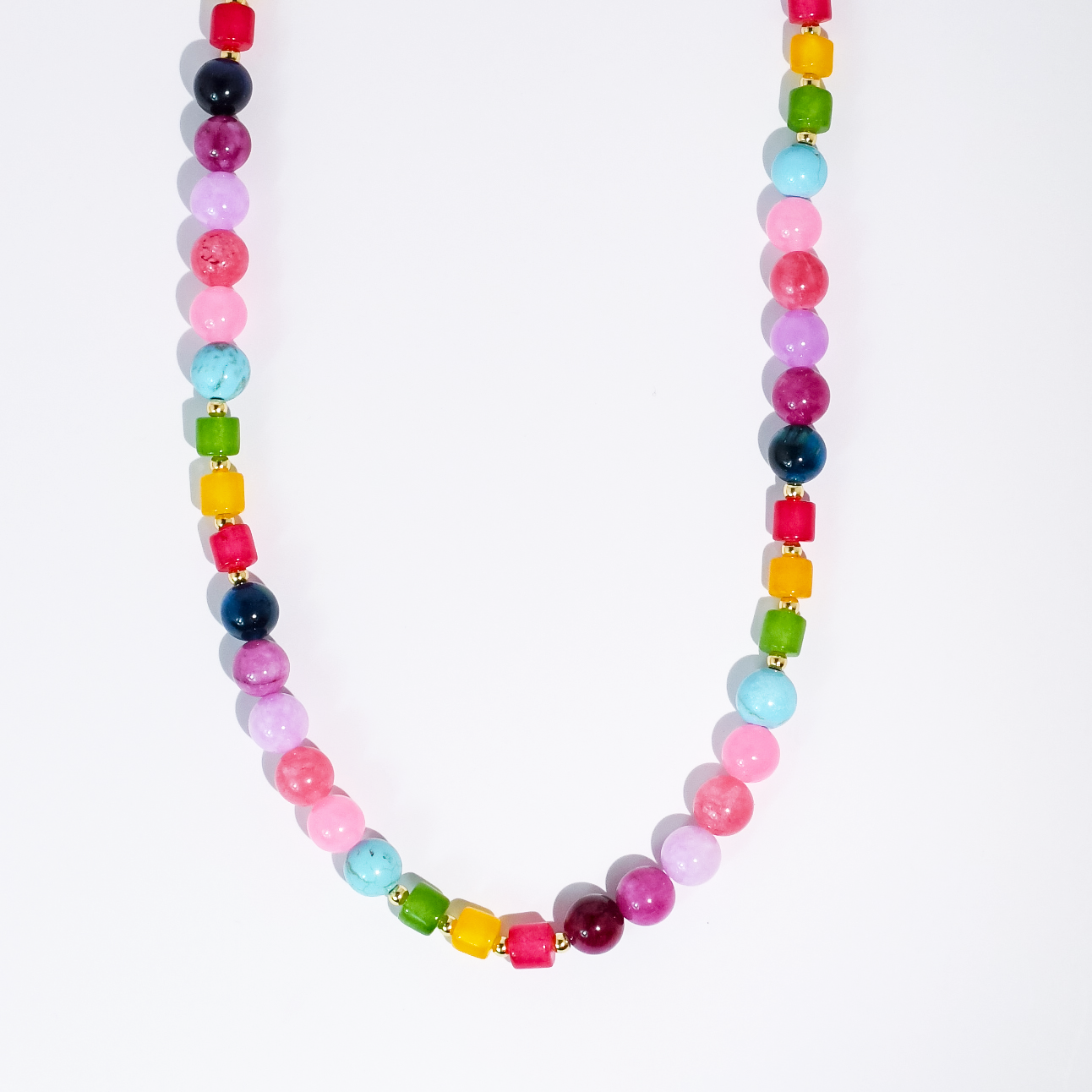 Colorful beaded necklace on a white background