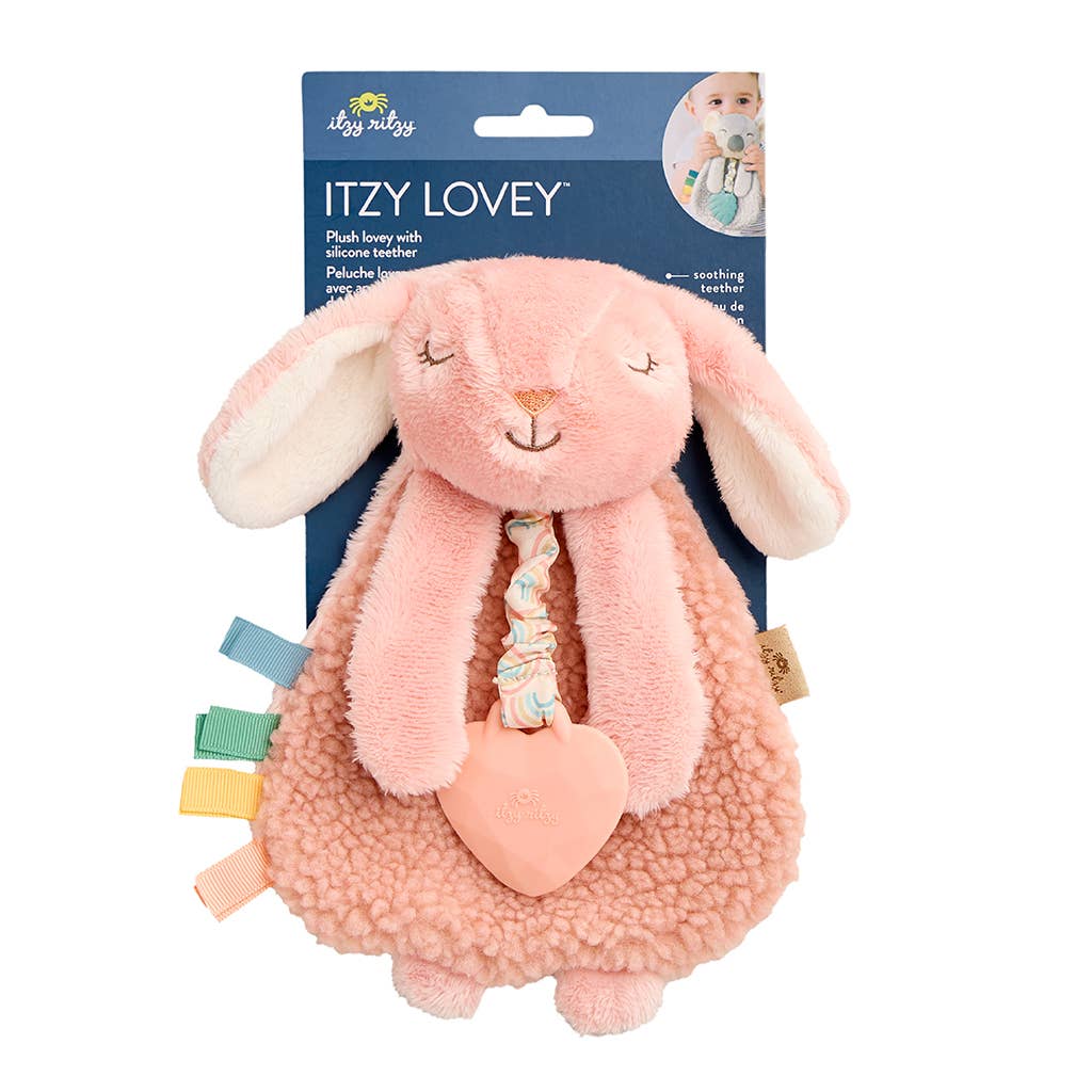 Pink plush bunny with silicone teether and tag, in packaging