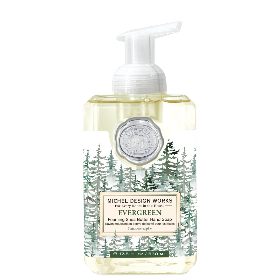 Michel Design Works Evergreen Foaming Hand Soap featuring festive holiday packaging and evergreen graphics.